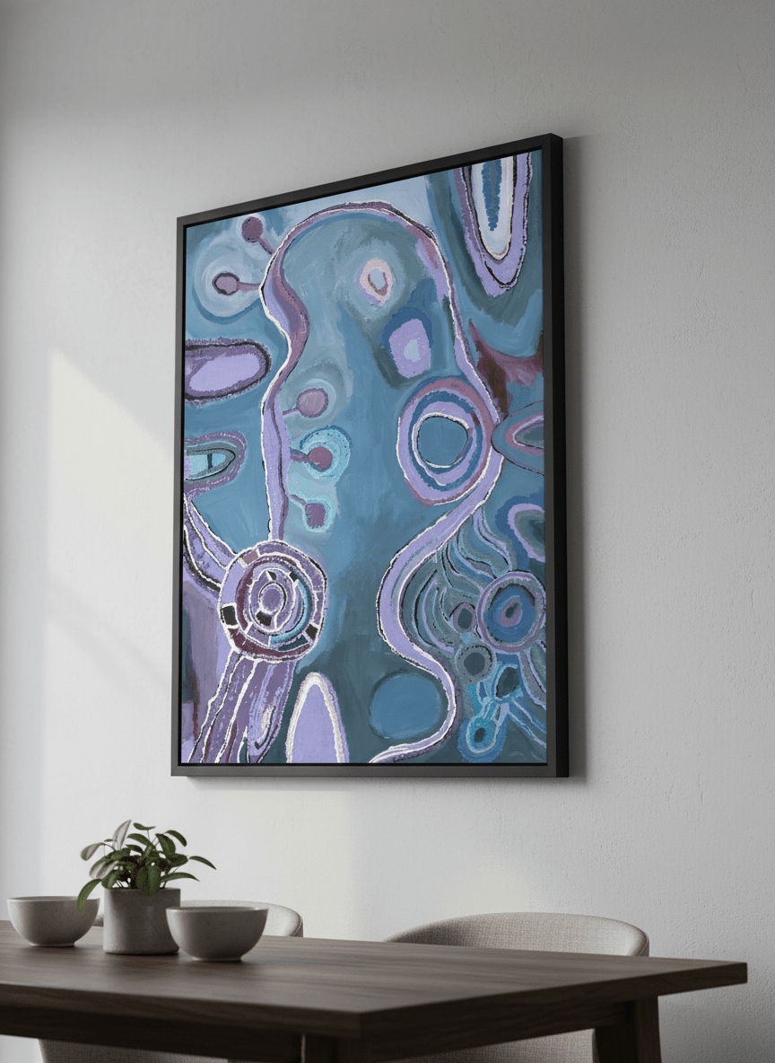 Wall art styled above a dining table in a contemporary home