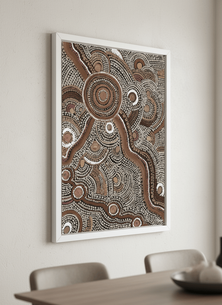 Wall art styled above a dining table in a contemporary home