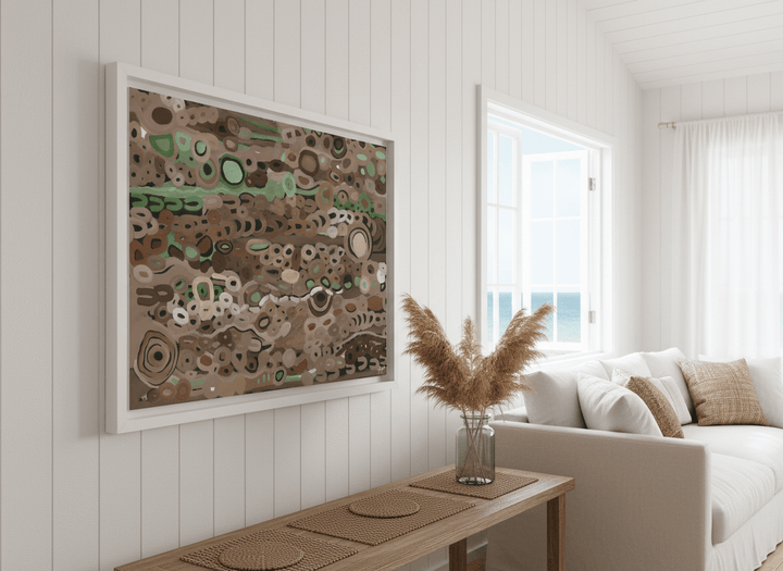 Neutral wall art displayed in a sunny coastal beach house