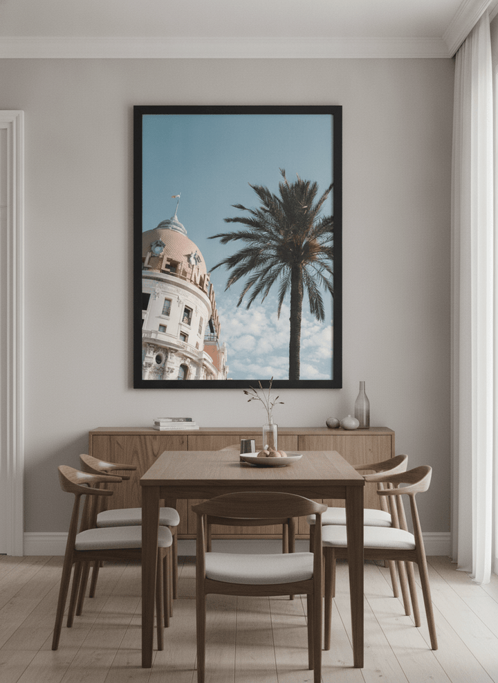 Wall art styled above a dining table in a contemporary home