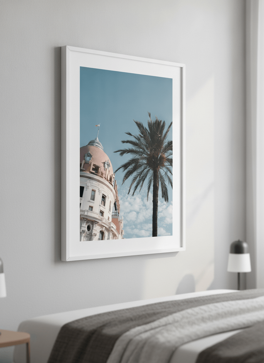 Minimalist artwork displayed in a calm, light-filled bedroom interior