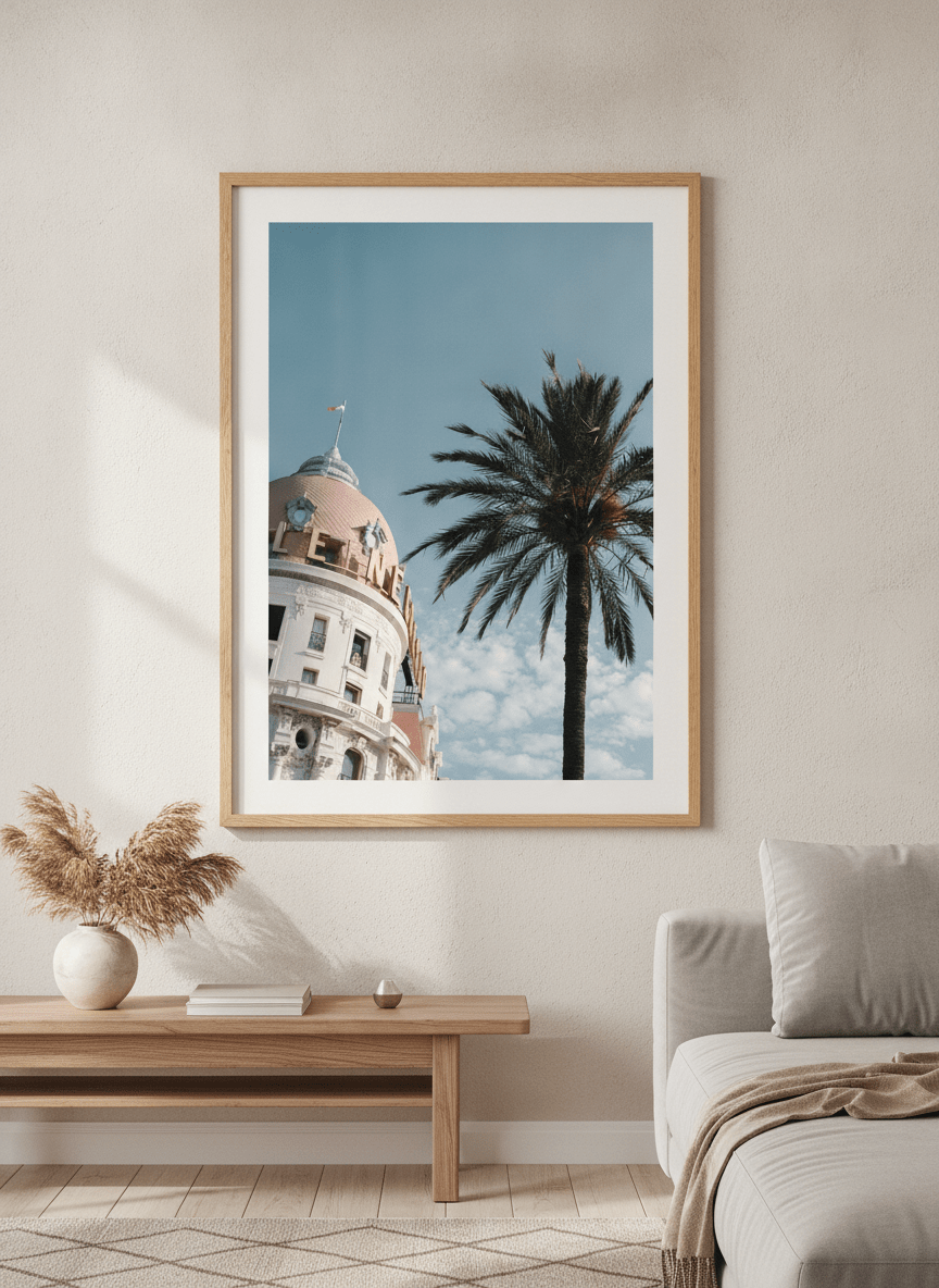 Modern wall art styled above a sofa in a neutral living room