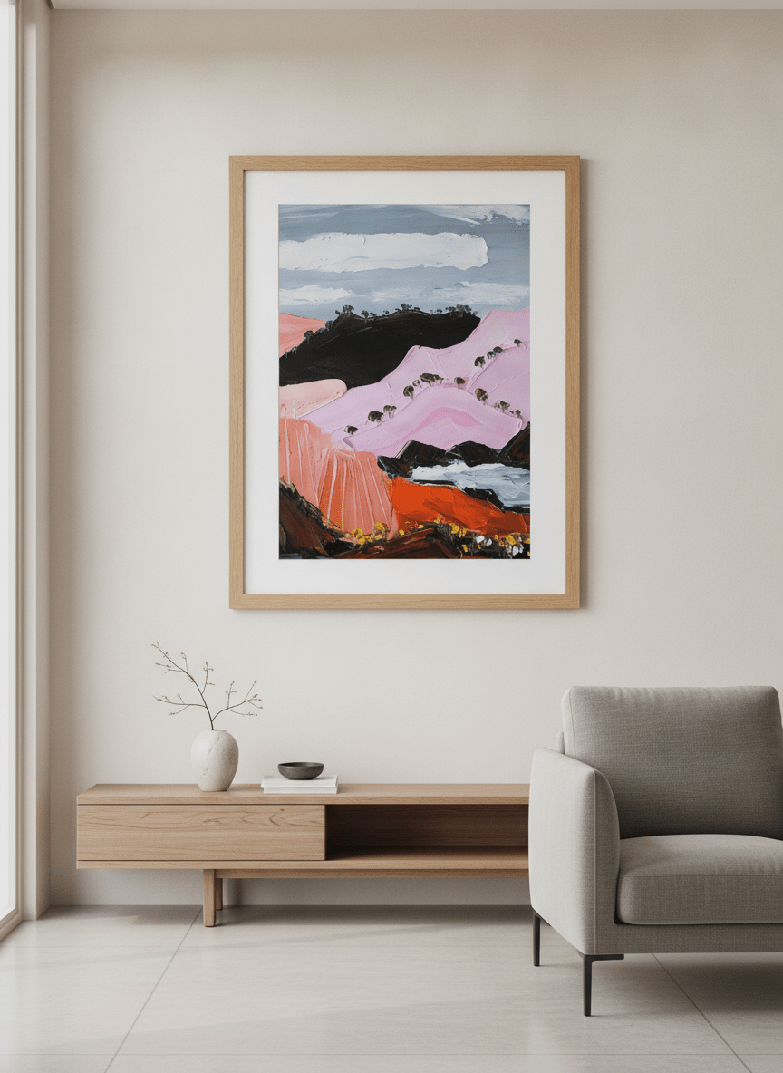 Modern wall art styled above a sofa in a neutral living room