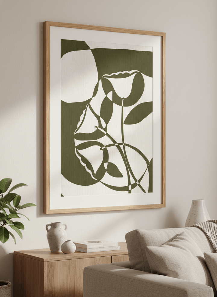 Modern wall art styled above a sofa in a neutral living room