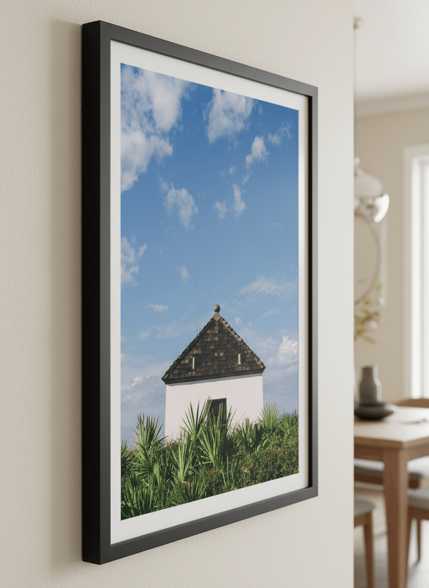 Wall art styled above a dining table in a contemporary home