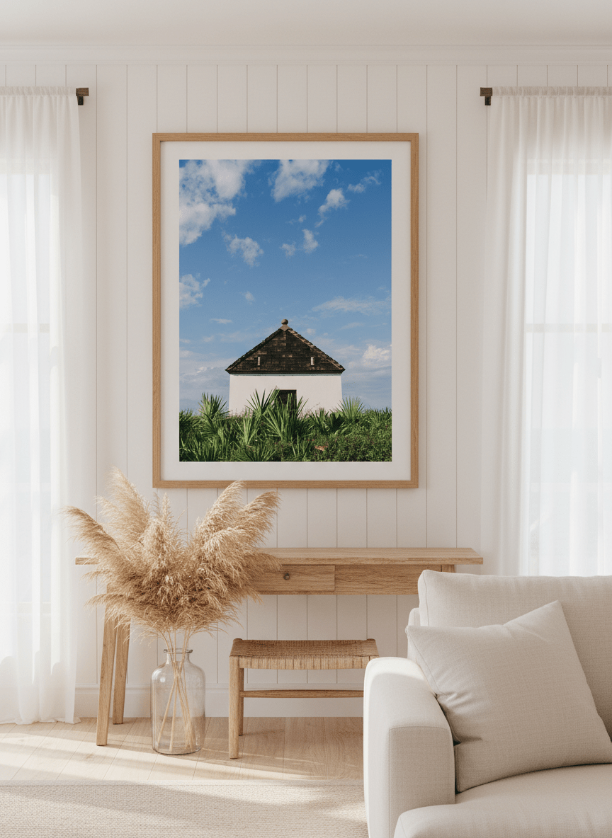 Neutral wall art displayed in a sunny coastal beach house