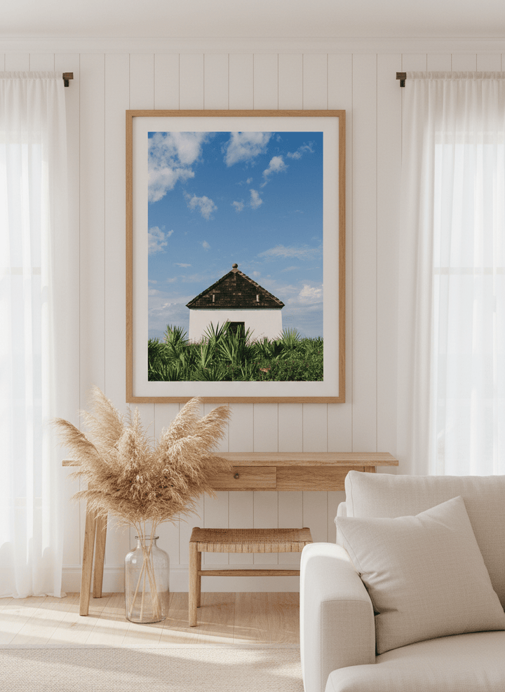 Neutral wall art displayed in a sunny coastal beach house
