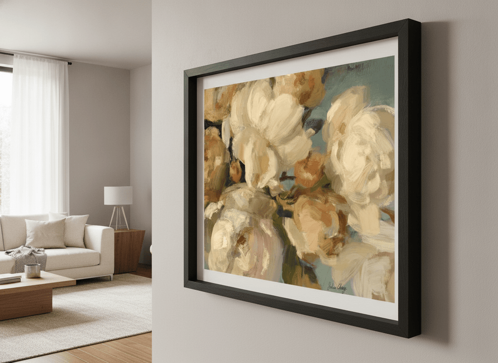 Modern wall art styled above a sofa in a neutral living room