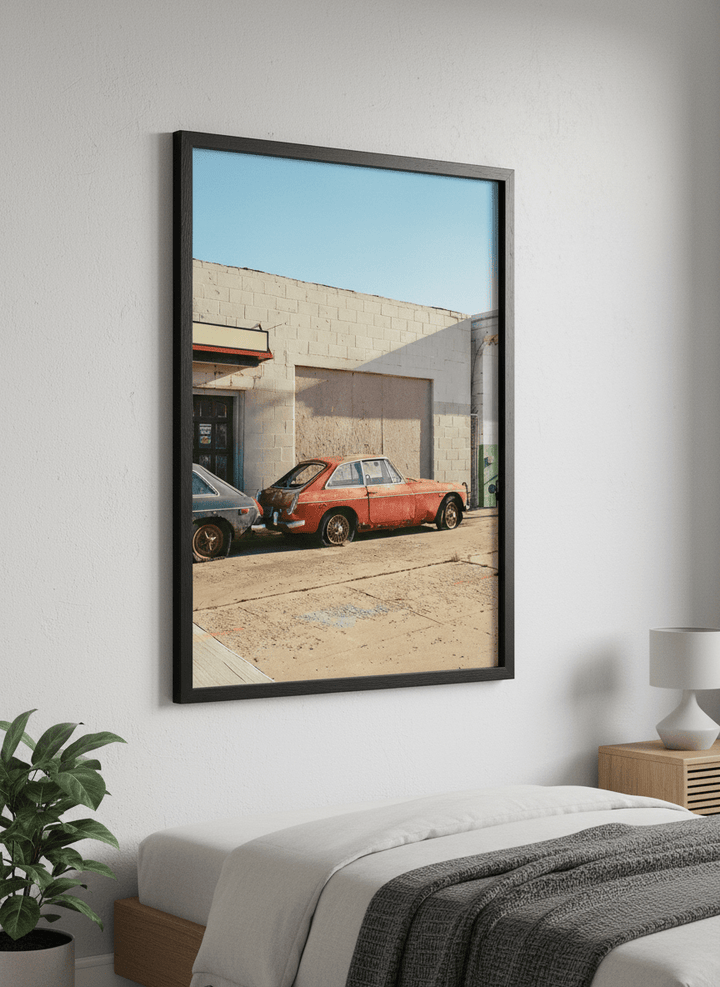 Minimalist artwork displayed in a calm, light-filled bedroom interior