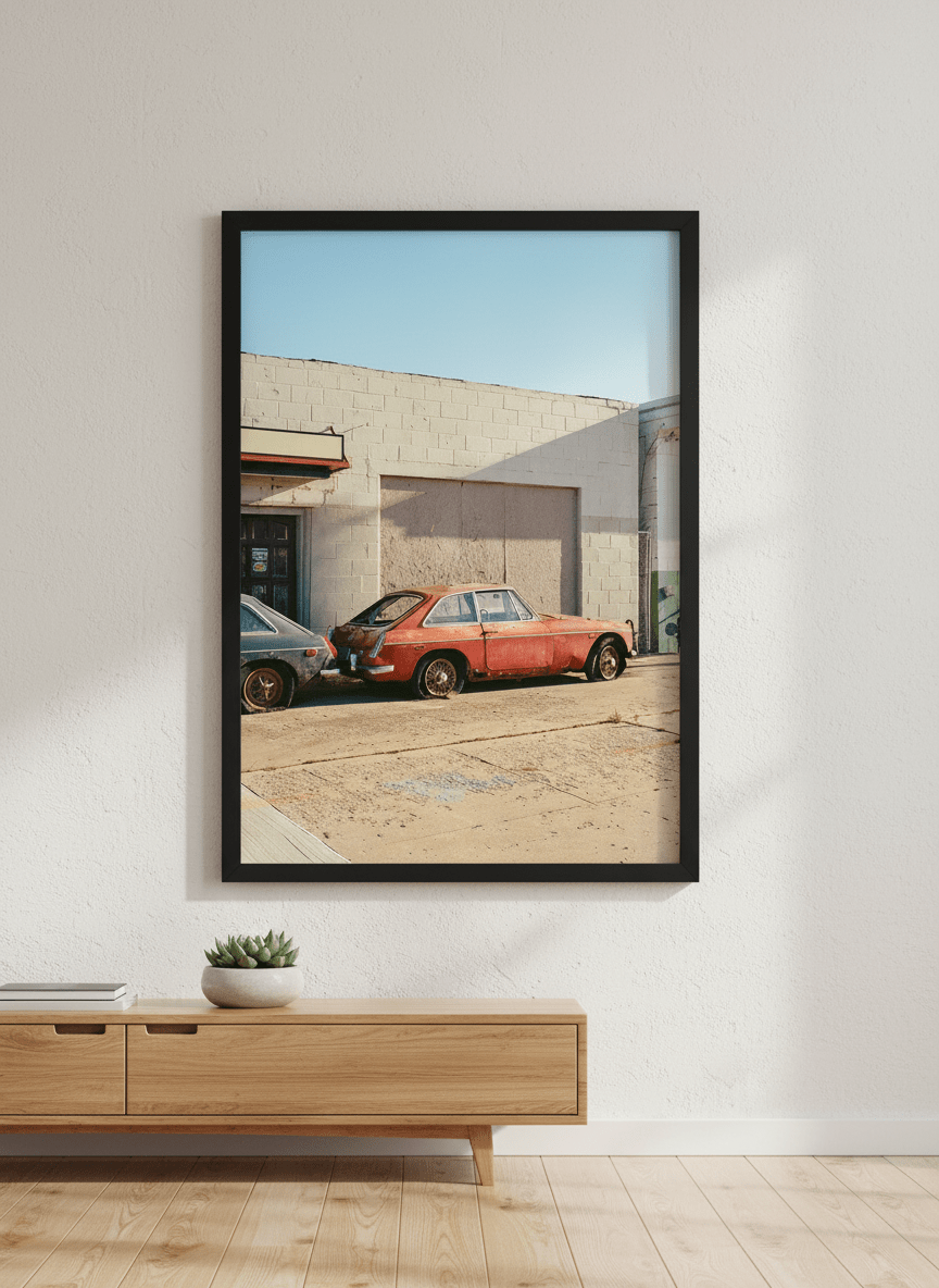Modern wall art styled above a sofa in a neutral living room