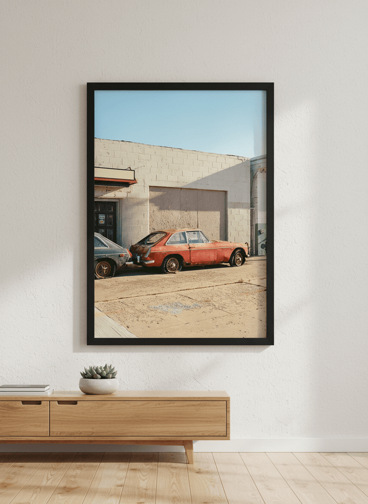 Modern wall art styled above a sofa in a neutral living room