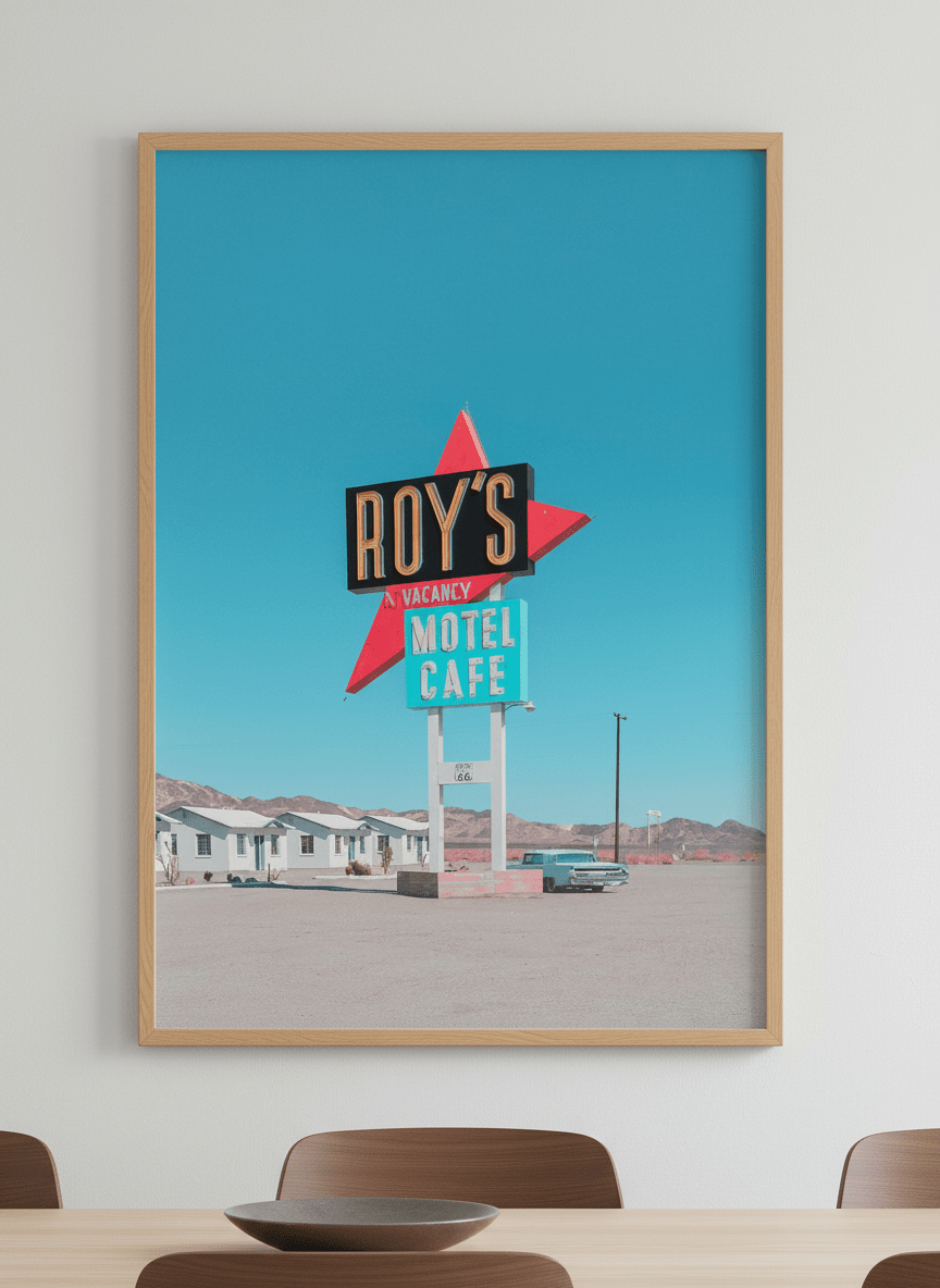 Wall art styled above a dining table in a contemporary home