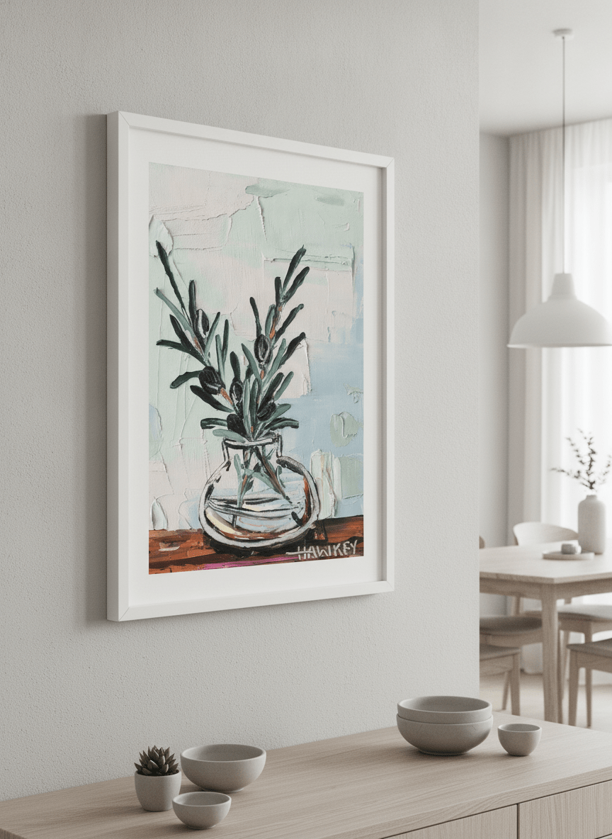 Wall art styled above a dining table in a contemporary home