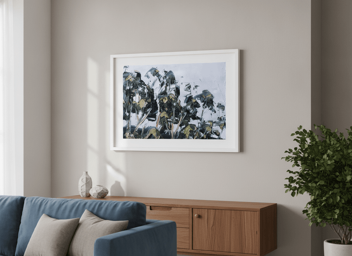 Modern wall art styled above a sofa in a neutral living room