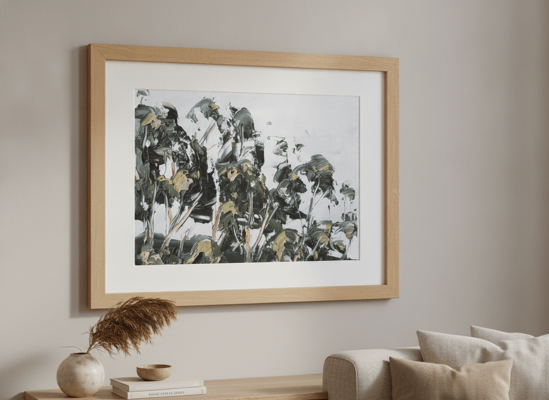 Modern wall art styled above a sofa in a neutral living room