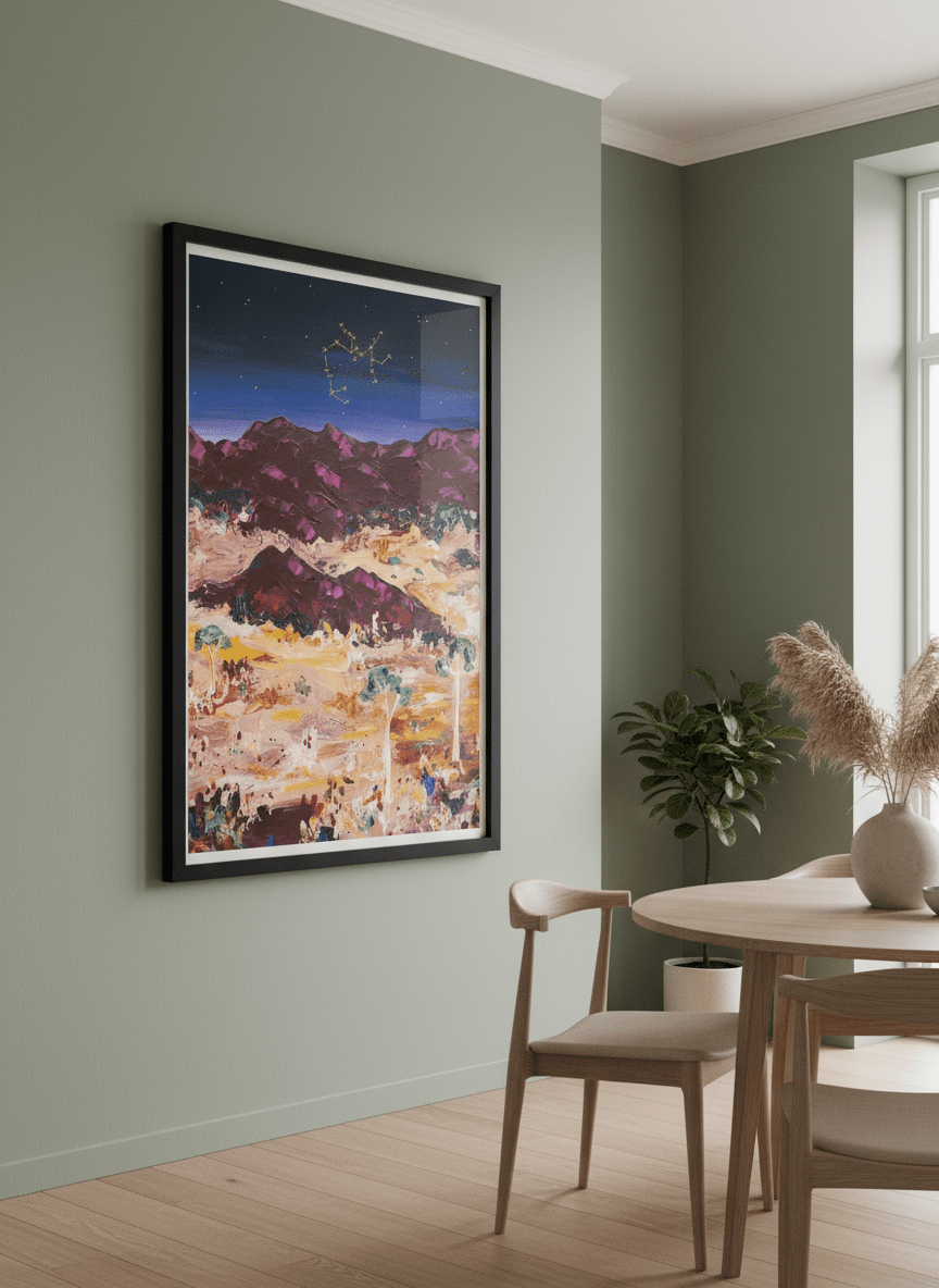 Wall art styled above a dining table in a contemporary home