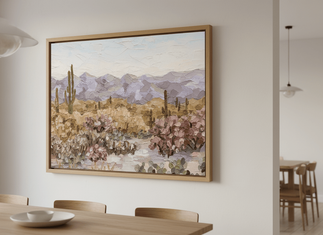 Wall art styled above a dining table in a contemporary home