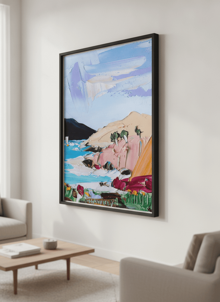 Modern wall art styled above a sofa in a neutral living room