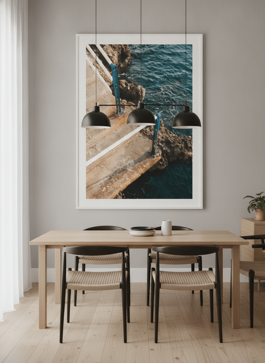 Wall art styled above a dining table in a contemporary home