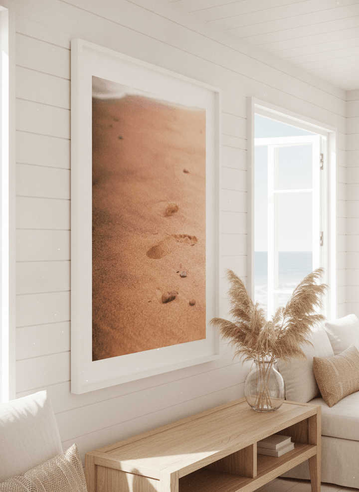Neutral wall art displayed in a sunny coastal beach house