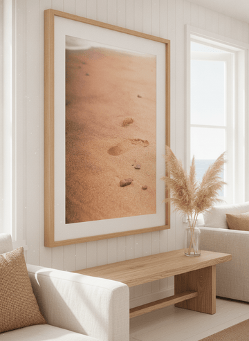 Neutral wall art displayed in a sunny coastal beach house