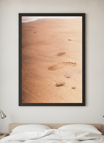Minimalist artwork displayed in a calm, light-filled bedroom interior