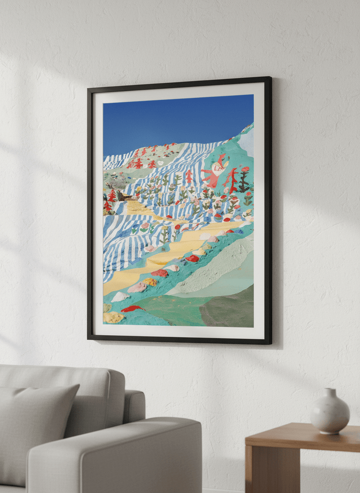 Modern wall art styled above a sofa in a neutral living room