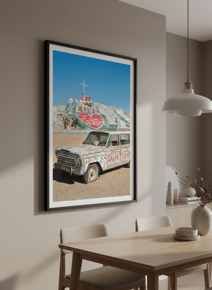 Wall art styled above a dining table in a contemporary home