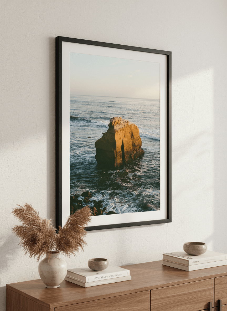 Wall art styled above a dining table in a contemporary home