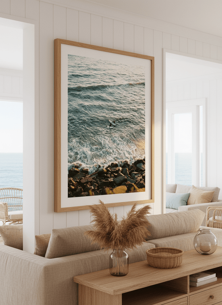 Neutral wall art displayed in a sunny coastal beach house