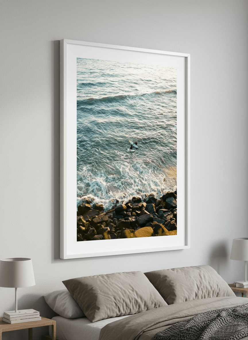 Minimalist artwork displayed in a calm, light-filled bedroom interior