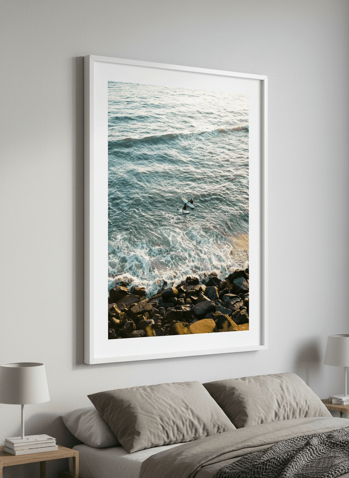 Minimalist artwork displayed in a calm, light-filled bedroom interior