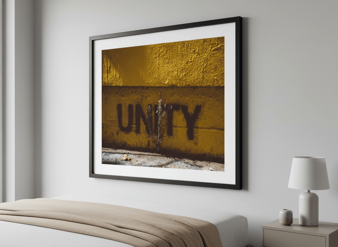 Minimalist artwork displayed in a calm, light-filled bedroom interior