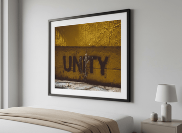 Minimalist artwork displayed in a calm, light-filled bedroom interior