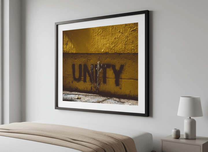 Minimalist artwork displayed in a calm, light-filled bedroom interior