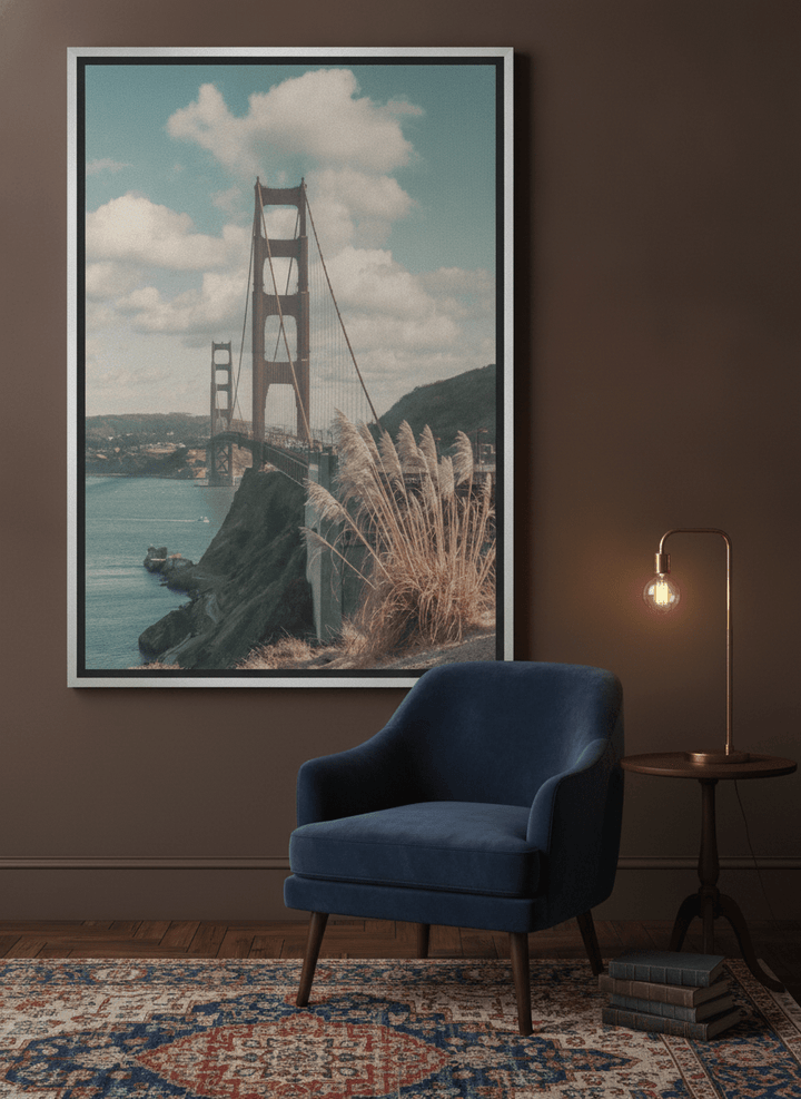 Canvas wall art with a silver leaf surround leaning against the wall in a moody home office