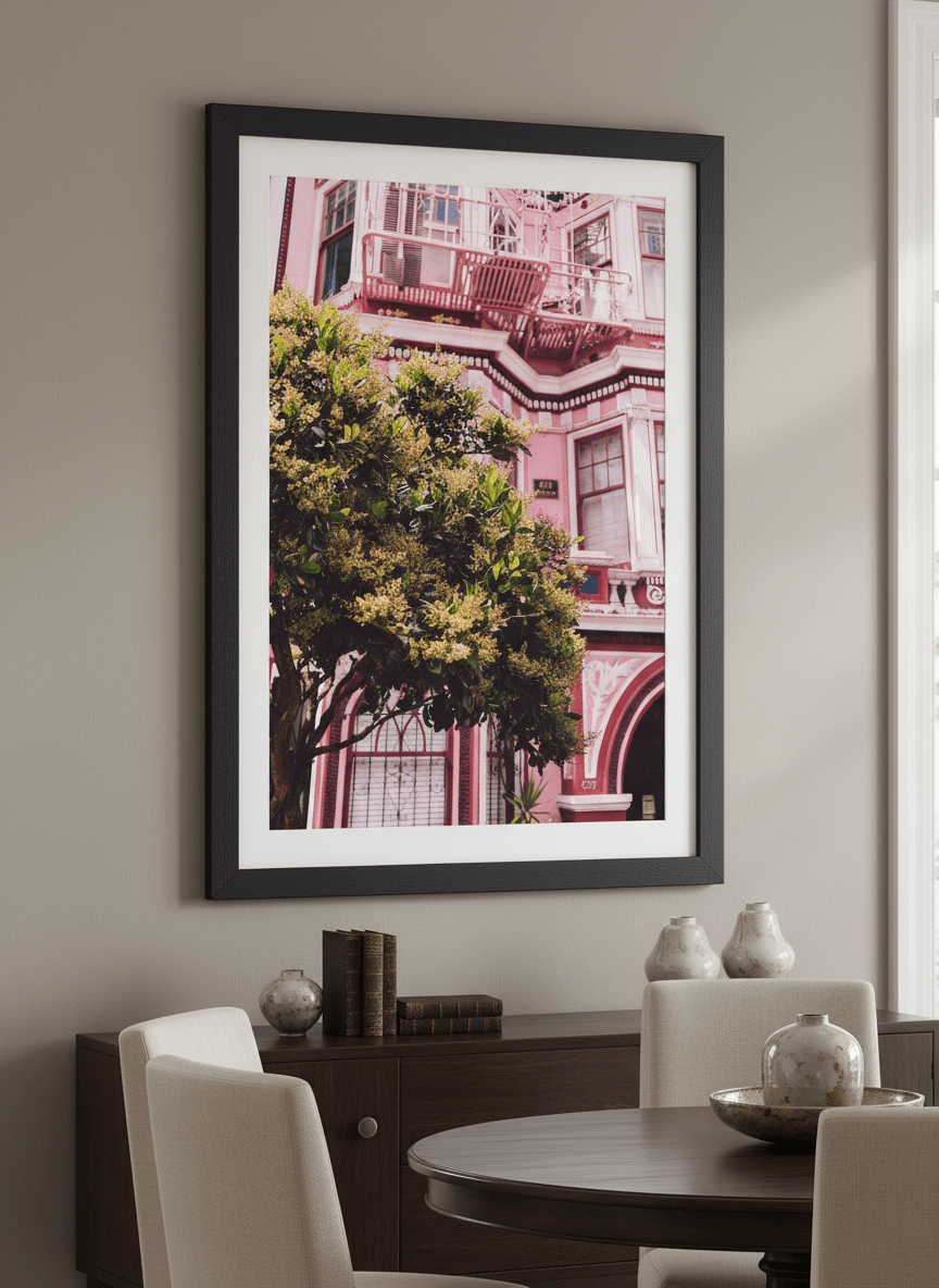 Wall art styled above a dining table in a contemporary home