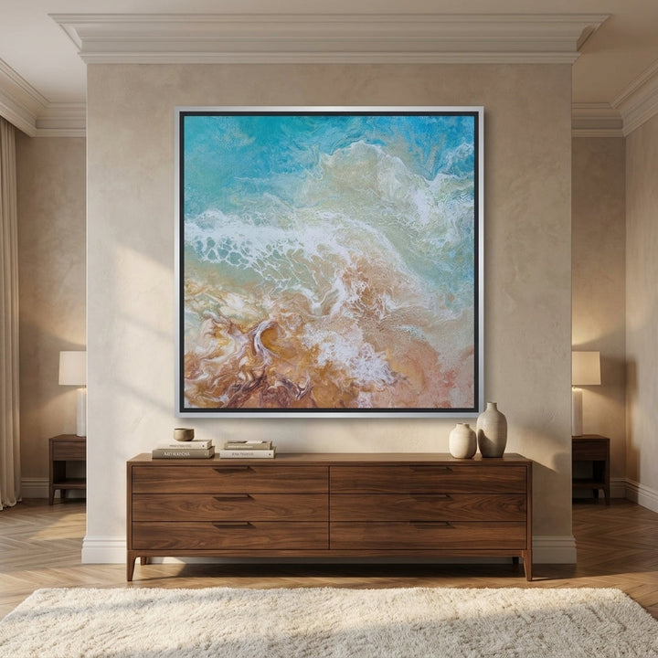 Oversized statement canvas wall art with a silver leaf surround styled in a luxe interior