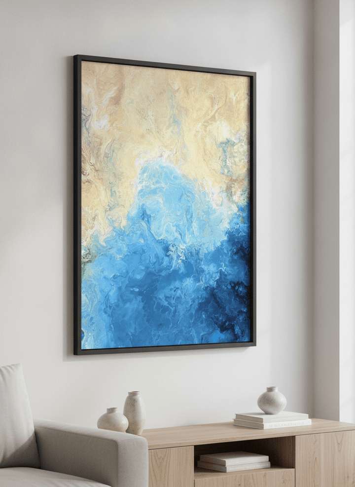 Modern wall art styled above a sofa in a neutral living room