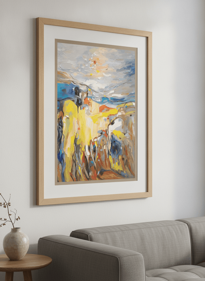Modern wall art styled above a sofa in a neutral living room