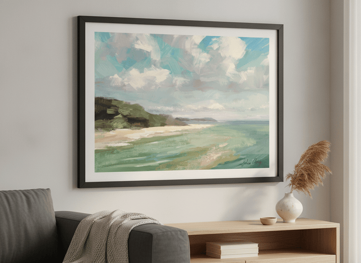 Modern wall art styled above a sofa in a neutral living room