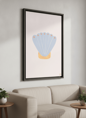 Modern wall art styled above a sofa in a neutral living room