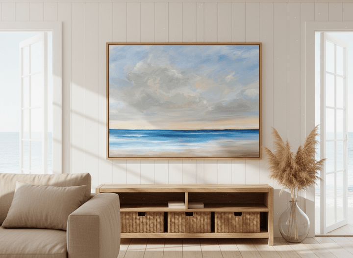 Neutral wall art displayed in a sunny coastal beach house