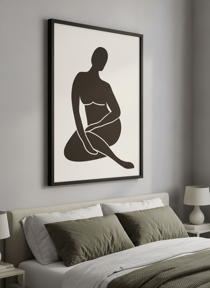 Minimalist artwork displayed in a calm, light-filled bedroom interior
