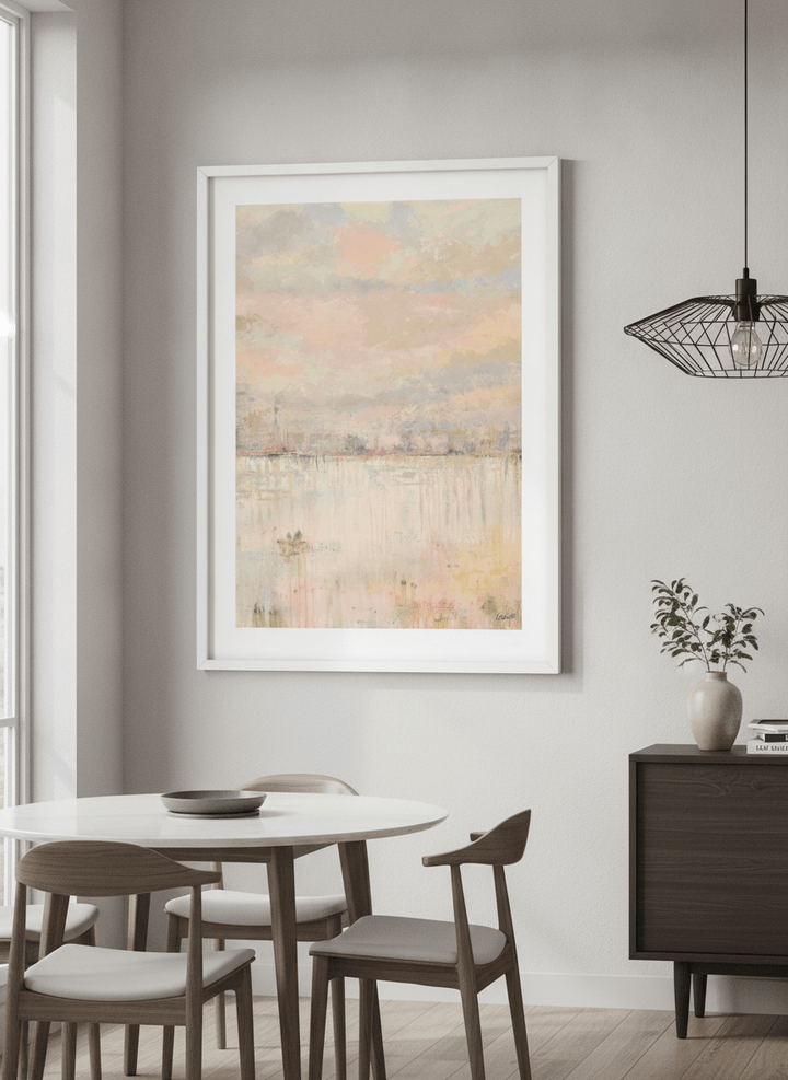 Wall art styled above a dining table in a contemporary home