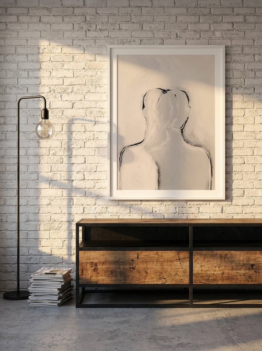 Modern wall art print styled on the wall in an industrial loft living room