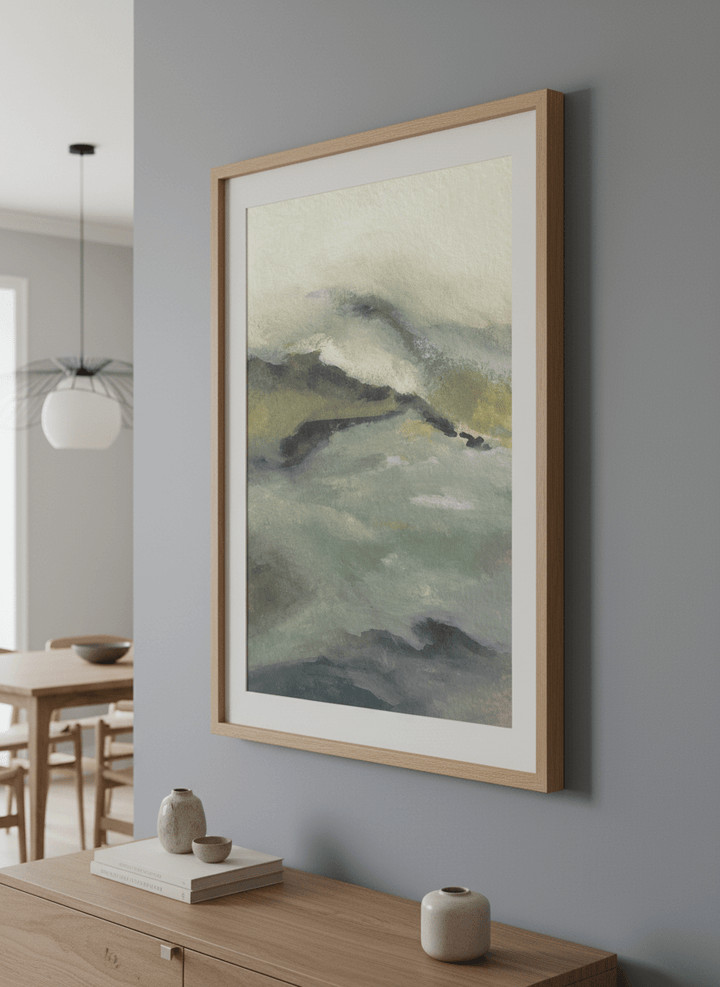 Wall art styled above a dining table in a contemporary home