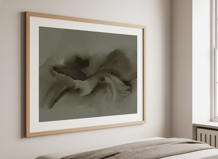 Minimalist artwork displayed in a calm, light-filled bedroom interior