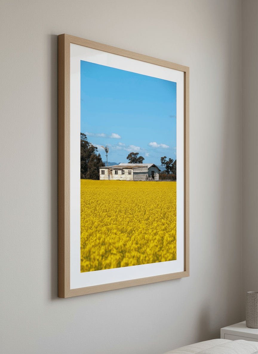 Minimalist artwork displayed in a calm, light-filled bedroom interior