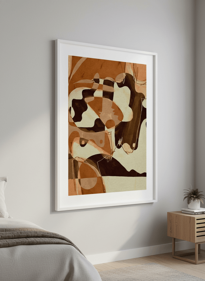 Minimalist artwork displayed in a calm, light-filled bedroom interior